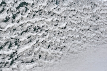 Fence covered with snow and ice