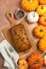 pumpkin chocolate chip bread on wooden board