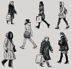 Freehand drawings of casual female pedestrians striding down street