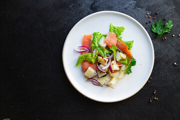 salmon fish seafood salad vegetables lettuce potato ready to eat on the table for healthy meal snack outdoor top view copy space for text food background rustic keto or paleo diet pescetarian
