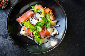 salmon fish seafood salad vegetables lettuce potato ready to eat on the table for healthy meal snack outdoor top view copy space for text food background rustic keto or paleo diet pescetarian