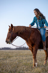 Fototapeta premium Young Woman Training Horse