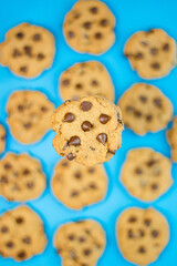 chocolate chip cookies on blue background
