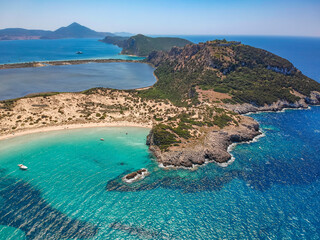 Aerial panorama view of the famous semicircular sandy beach and lagoon of Voidokilia in Messenia, Greece © panosk18