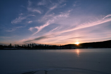 Sunset at the local lake outside of Oslo. Bogstadvannet in Nordmarka or Oslomarka it is called. This is a popular lake for fishing, skating and winter activities. 