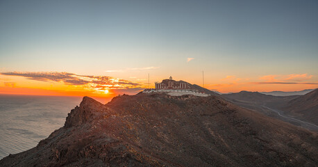 Lighthouse on a cliff on the canary island of Fuerteventura