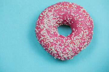 freshly baked donuts isolated on blue background