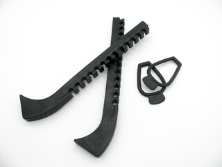 Plastic black  blade guards for Figure skates on white background