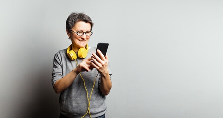 Woman in yellow headphones
