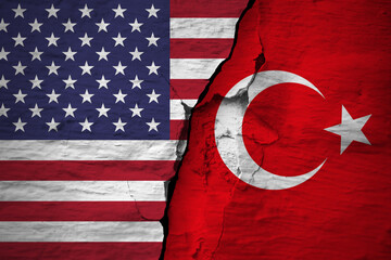 Conflict between countries. United States of America and Turkey flags on the cracked concrete wall....