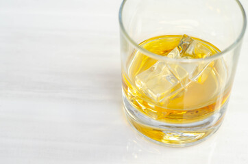 Excellent whisky served with ice cubes in a glass of Old fashioned type