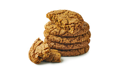 Stack of oatmeal cookies with crumbs on white