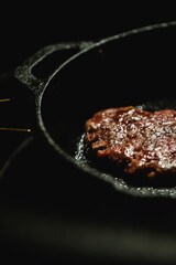 grilled meat on a frying pan - burger