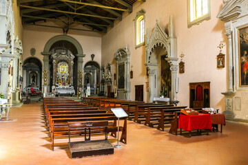 Fototapeta na wymiar Volterra, Italy. Beautiful interiors of catholic church (Chiesa di San Francesco) in Volterra.