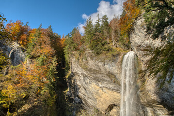 Mountain lake landscape. Mountain lake Walensee on background of majestic mountains. Tourist destination. Swiss Alps. Switzerland. 