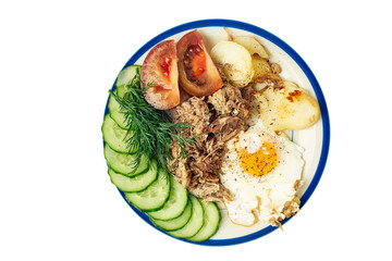 Breakfast with egg, pork and vegetables on white