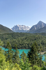West side view of snowy Zugspitze from Fernpass Austria Blindsee lake
