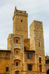 Fototapeta na wymiar San Gimignano, Italy. View of medieval towers at the central square of San Gimignano.