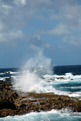 waves crashing on rocks