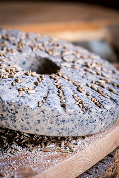 Device for the manufacture of flour of the old type, stone millstones on a wooden platform,