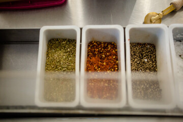 A tray containing three different spices