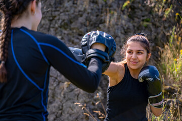  Pretty young girl practices boxing