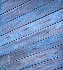 Texture of boards that are painted with blue under the old days