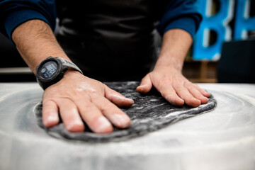 Charcoal pizza base with pepperoni