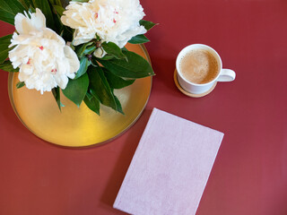 White peonies and fresh coffee