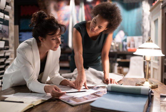 Multiracial designers working on project together