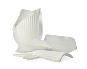 Broken bright ceramic vase isolated on white