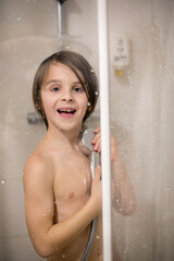 Preteen boy, taking shower, child washing