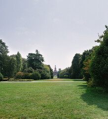 Large green field in front of the palace
