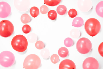 Heart shape made of colorful balloons on white background with copy space, balloon background, happy valentine's day, mother's day, flat lay, top view