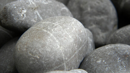 Close up peddles background. Grey stones wallpaper. Minerals ocean 