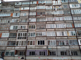 many different windows in a tall house