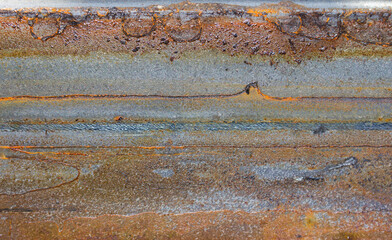 Rusty metal plank surface background.