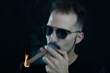 man smoking cigarette