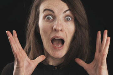 Portrait of a surprised woman