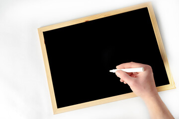 Fondo blanco con pizarra  para escribir notas o hacer la lista de la compra