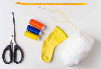 How to make an Easter bunny.  Materials for sewing, sock, scissors, filler for the workpiece. DIY...