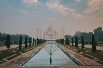 Taj Mahal reflection at sunrise as seen from Char Bagh pool, Agra, India