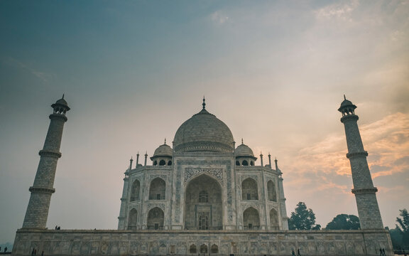 Taj Mahal west face against cloudy sky during sunrise time, Agra, India