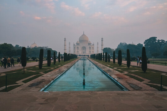 Taj Mahal reflection at sunrise as seen from Char Bagh pool, Agra, India