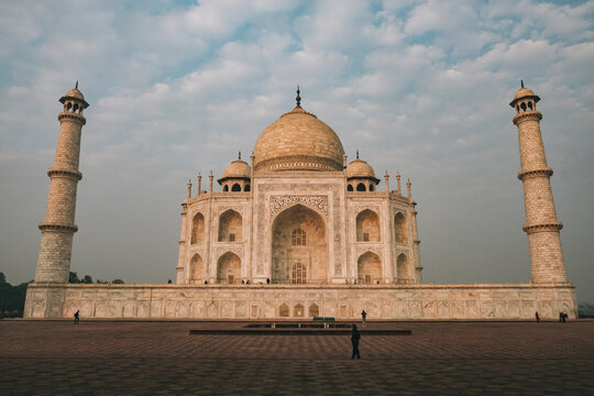 Taj Mahal east face against cloudy sky during sunrise time, Agra, India