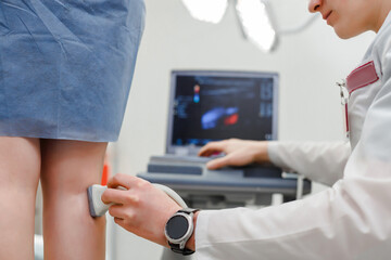 Doctor ultrasound knee test. Scan medical equipment. Diagnosis ultrasound foot.