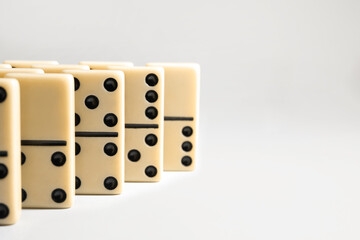 Domino tiles on white background. Space for text