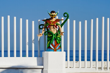 Mardi Gras statue in harbor of Cozumel Mexico