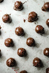 peanut butter chocolate truffles on baking sheet