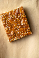 salted caramel nut bar on paper bag